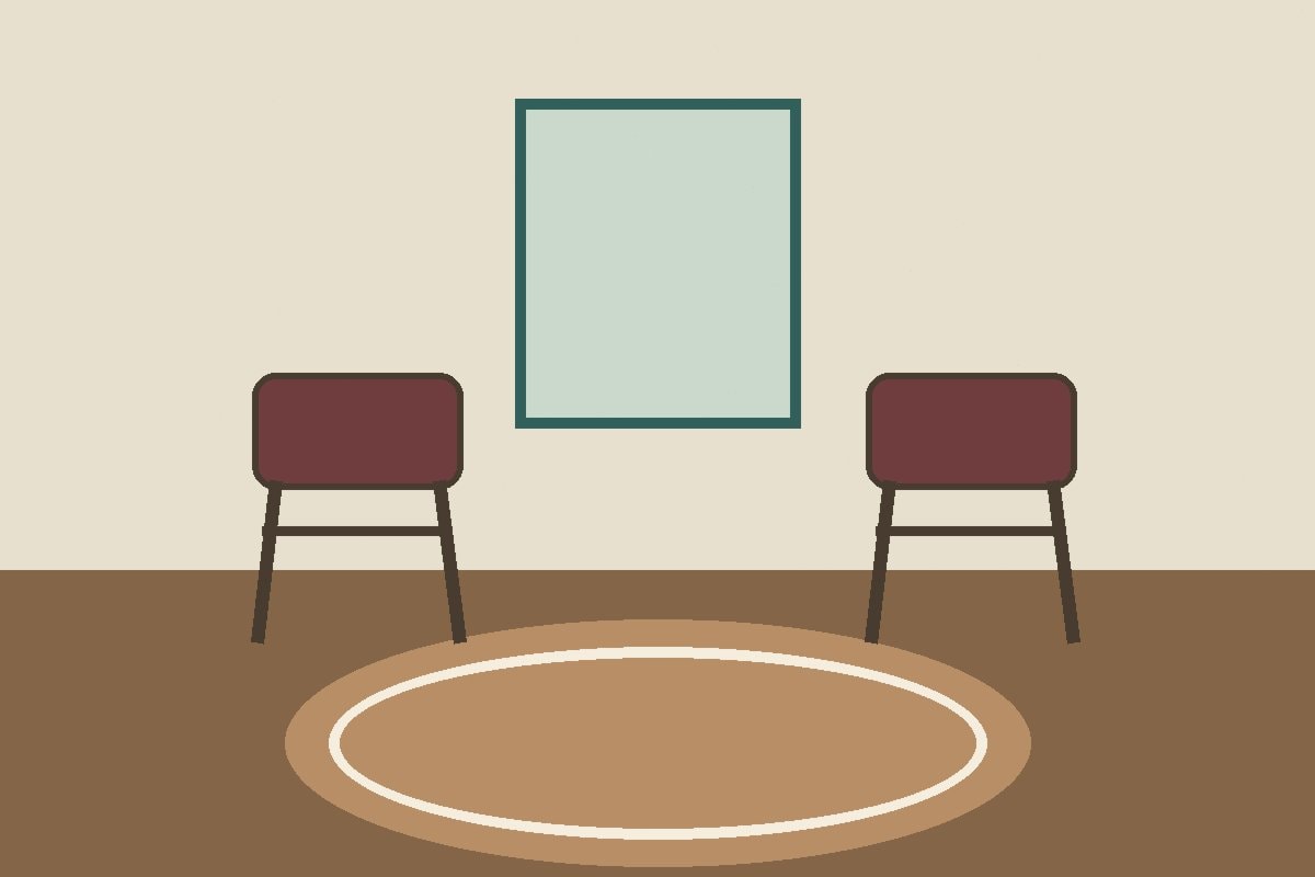 An empty room with two chairs, a woven rug and soft window light
