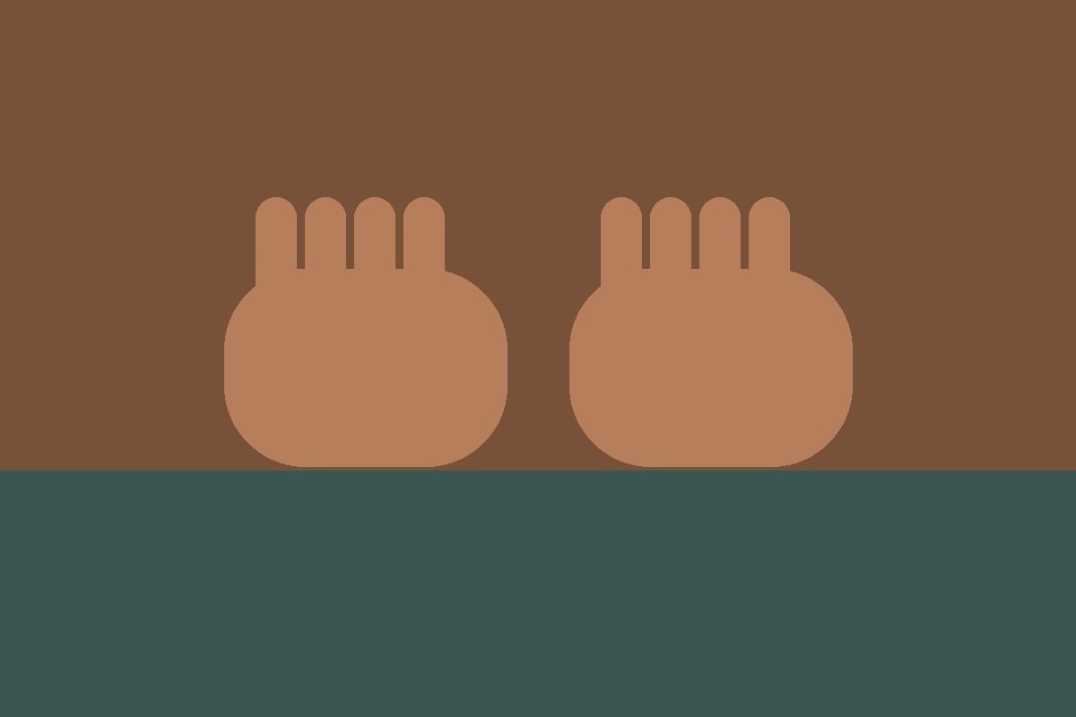 Two relaxed hands resting on a plain wooden table
